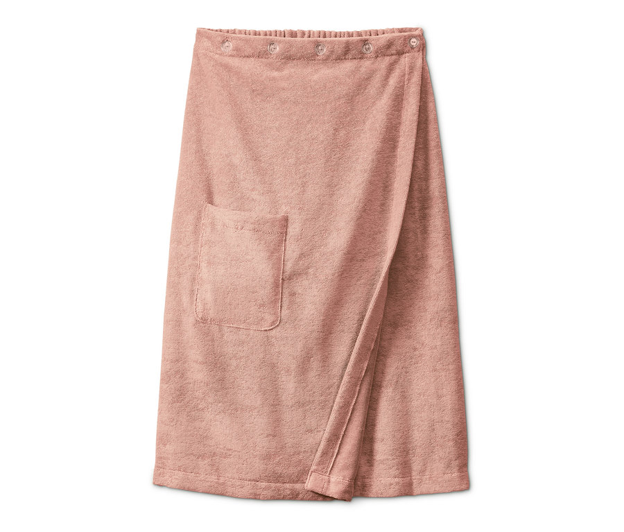 Ein rosa Sauna-Kilt mit einer Tasche.