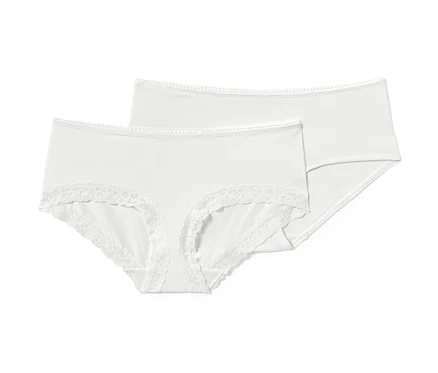 Zwei weiße Pantys liegen übereinander.