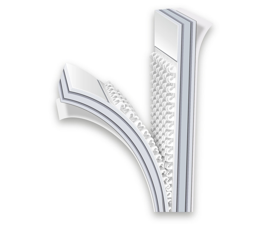 Nahaufnahme einer dreischichtigen Matratze, die die inneren Schichten zeigt.