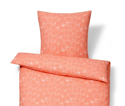 Orangefarbene Renforcé-Bettwäsche in Normalgröße mit weißem Blumenmuster, inklusive Kissen.