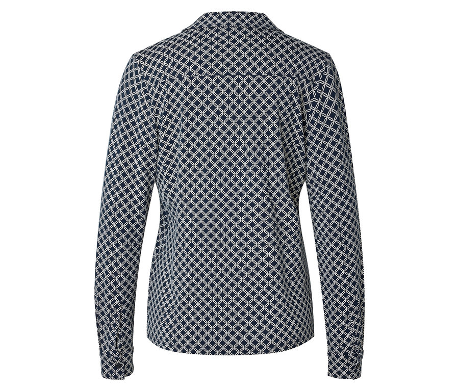 Rückansicht einer langärmeligen, taillierten Bluse mit einem geometrischen Muster aus sich überlappenden Kreisen in Marineblau und Weiß.