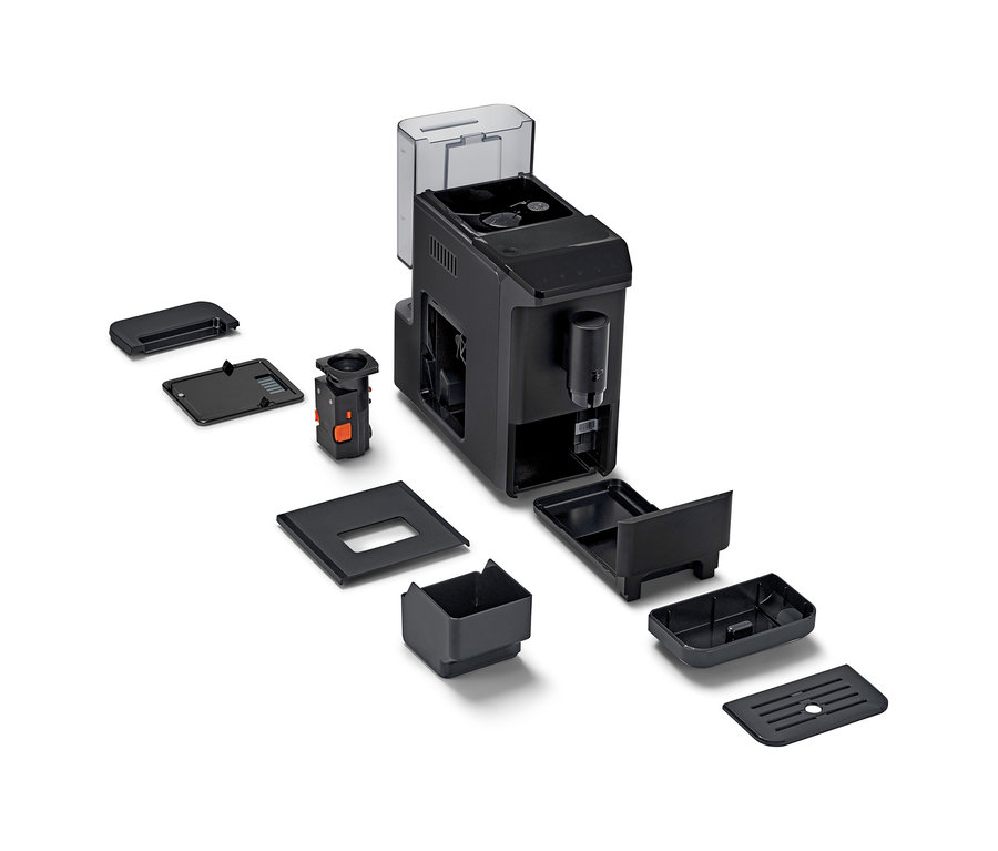 Ein zerlegter »Esperto mini« Kaffeevollautomat in Schwarz mit abnehmbaren Teilen.