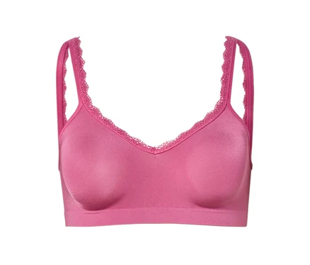 Nahaufnahme eines pinkfarbenen BHs mit Spitze an den Trägern und am Dekolleté.