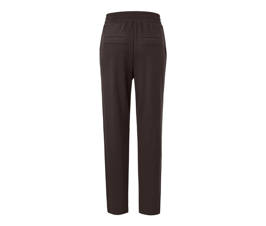Detailansicht einer dunkelbraunen Joggpants mit Biese von hinten.
