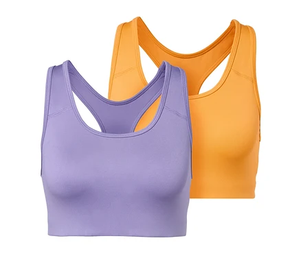 Zwei Sport-Bustiers, eins in Lila, eins in Orange.