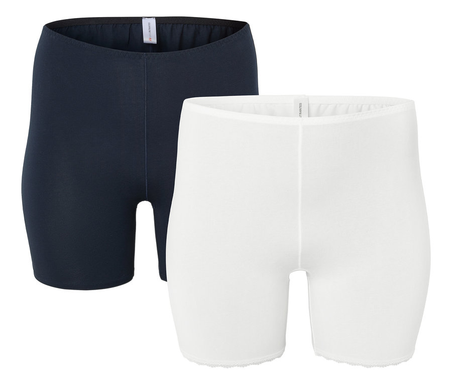 Zwei kurze Damenhosen: eine marineblau, eine weiss.