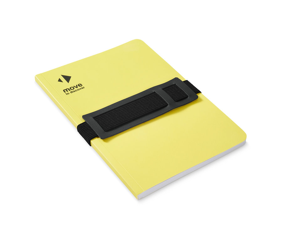 Gelbes Notizbuch mit schwarzem Gummiband.