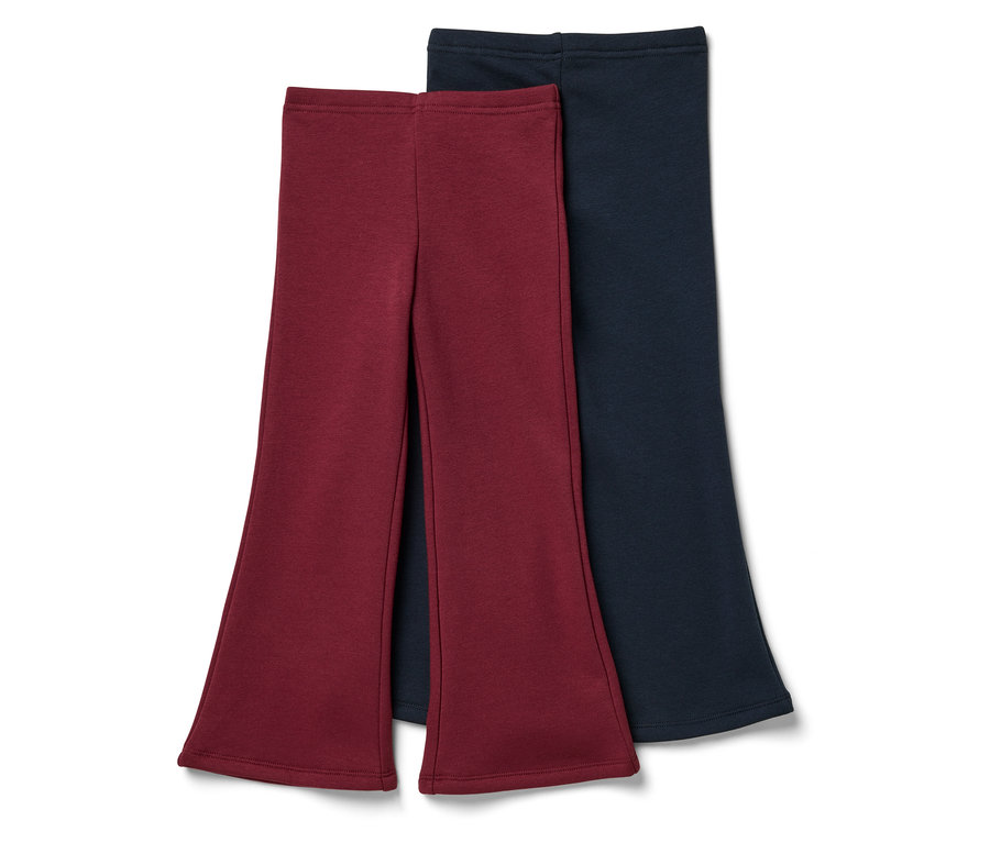 Zwei Schlaghosen, eine weinrot, eine marineblau.