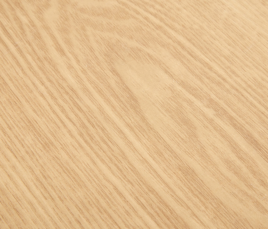 Detailaufnahme einer hellen Holzstruktur.