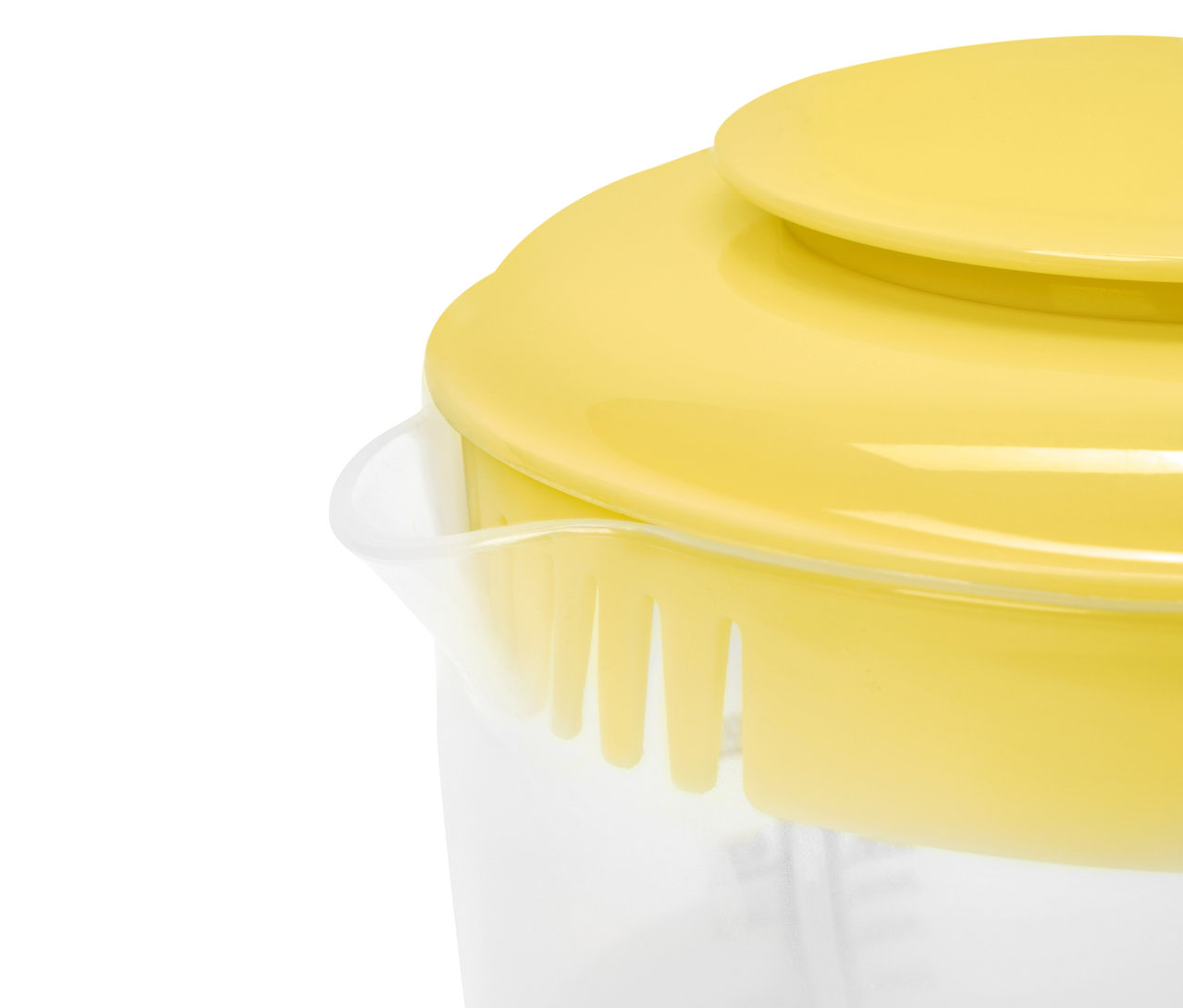 Gelber Deckel auf einem durchsichtigen Messbecher.