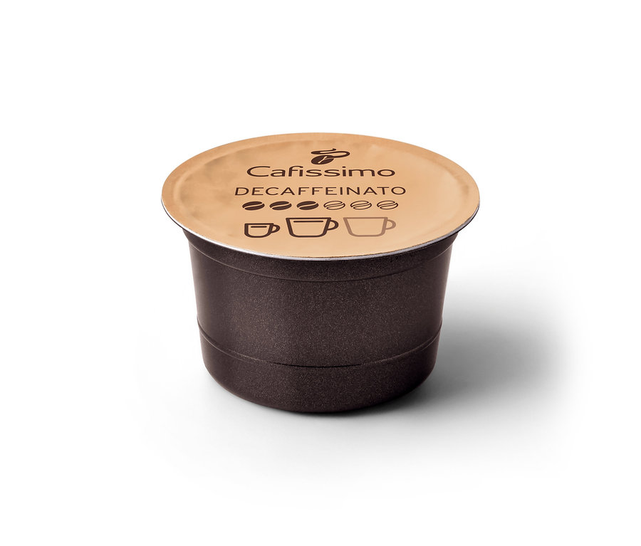 Nahaufnahme einer braunen Cafissimo Decaffeinato Kapsel mit beigem Deckel auf weißem Hintergrund.
