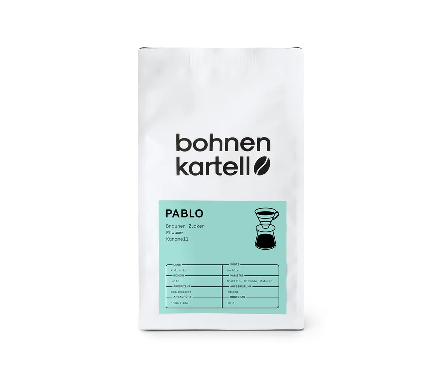 Weiße Packung bohnenkartell - Pablo Filterkaffee - 250 g Ganze Bohne mit Infos zu Karamell, Pflaume und braunem Zucker.