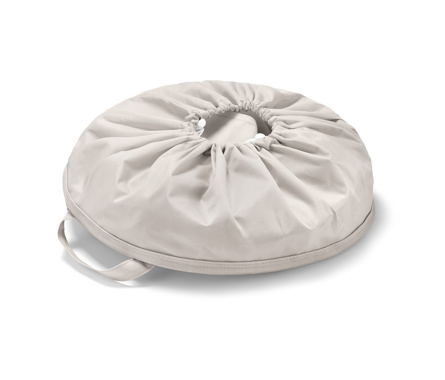 Beiger Wäschesammler mit Kordelzug.