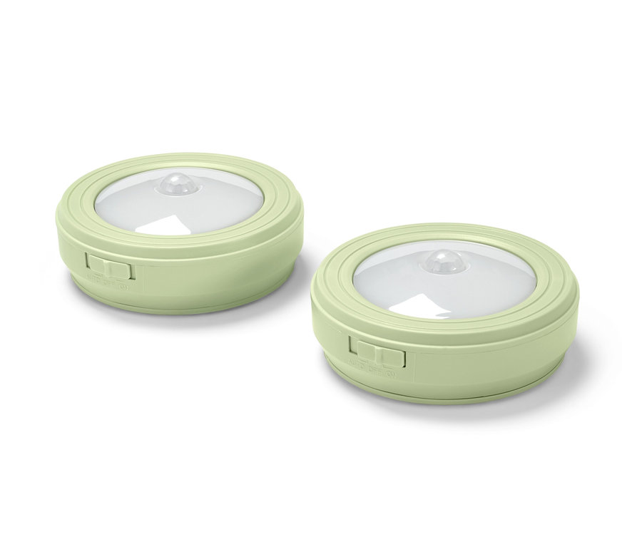 Zwei hellgrüne LED-Multifunktionsleuchten.