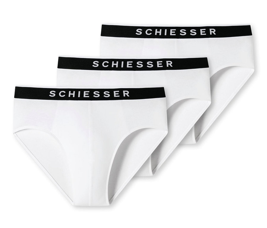 Drei weiße SCHIESSER Rio-Slips mit Bio-Baumwolle mit schwarzem Bund liegen übereinander.
