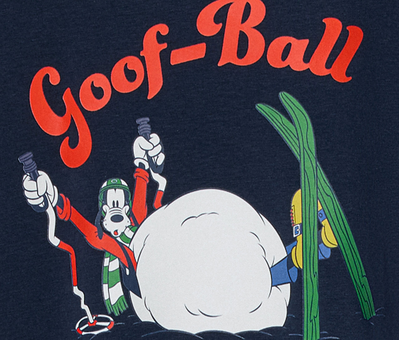 Cartoonfigur Goofy mit Skiausrüstung in verschneiter Szene mit dem Schriftzug "Goof-Ball".