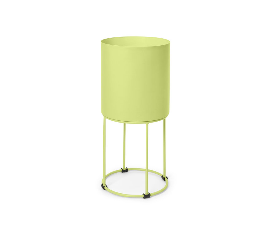 Eine runde, grüne Pflanzbox auf einem Gestell.