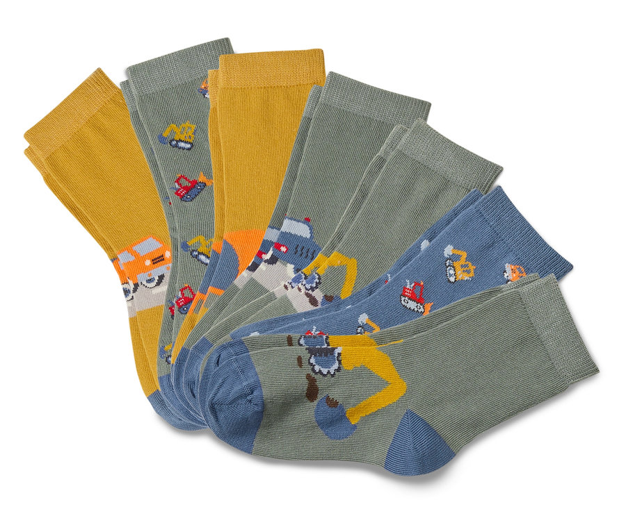 Mehrere Paare Kindersocken mit Baustellenmotiven.