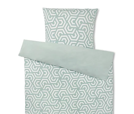 Bettwäsche-Set mit geometrischem Muster in Weiß und Grün.