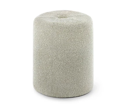 Zylindrischer Hocker, bezogen mit einem hellbeigen, strukturierten Bouclé-Stoff, mit einer leichten Vertiefung an der Oberseite.