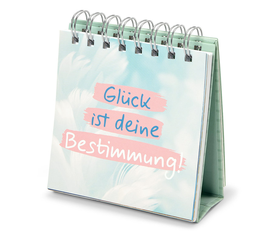 Tischkalender zeigt den Spruch "Glück ist deine Bestimmung!"