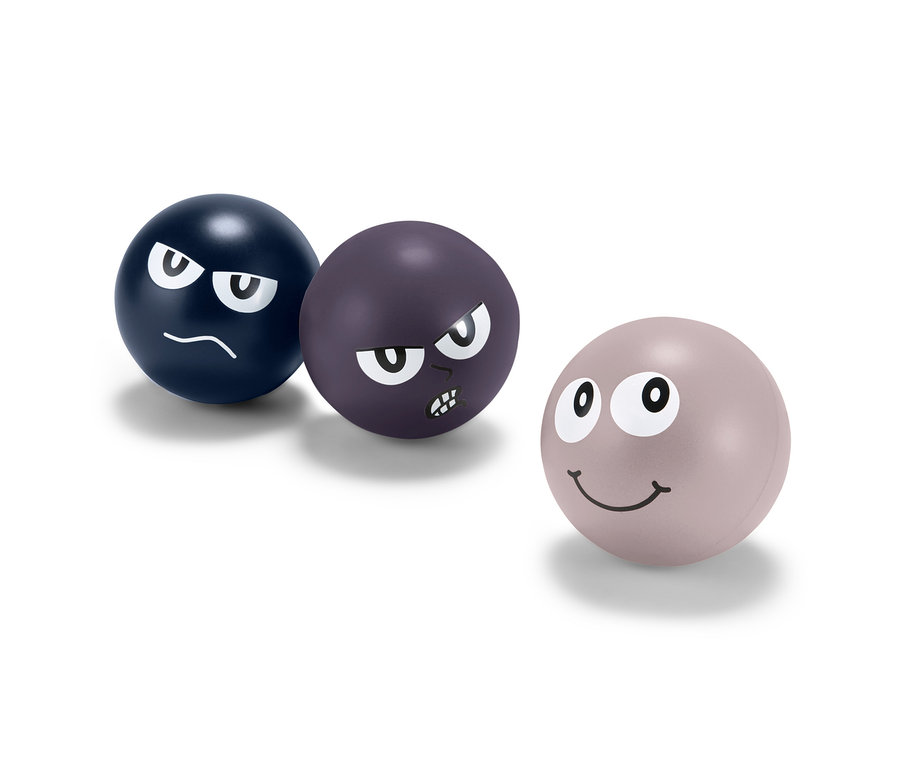 Drei Antistress-Bälle mit verschiedenen Gesichtsausdrücken.