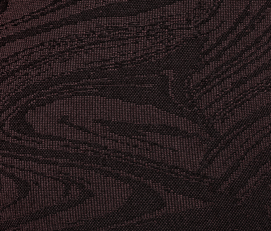 Detailaufnahme einer nahtlosen, dunkelbraun gemusterten Seamless-Tight.