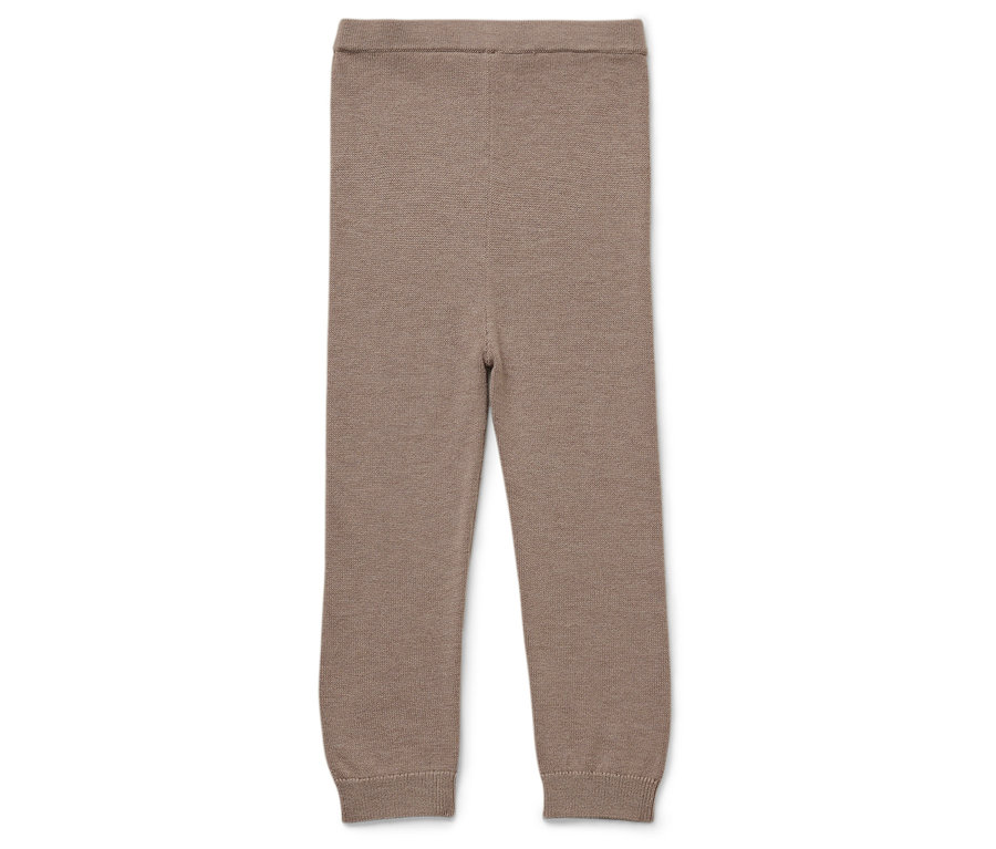 Beige Strickleggings auf weißem Hintergrund.