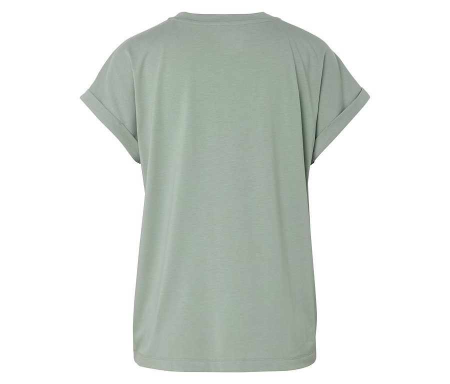 Nahaufnahme der Rückseite eines hellgrünen T-Shirts mit gerollten Ärmeln.