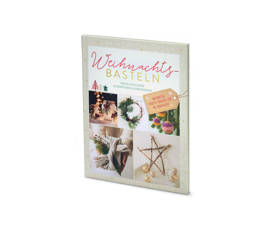 Buch "Weihnachtsbasteln" mit Fotos von Weihnachtsdekorationen.