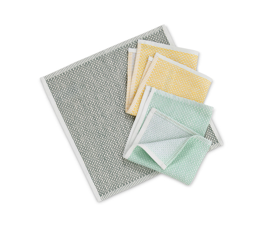 Drei Spültücher: eines grau, eines gelb und eines grün.