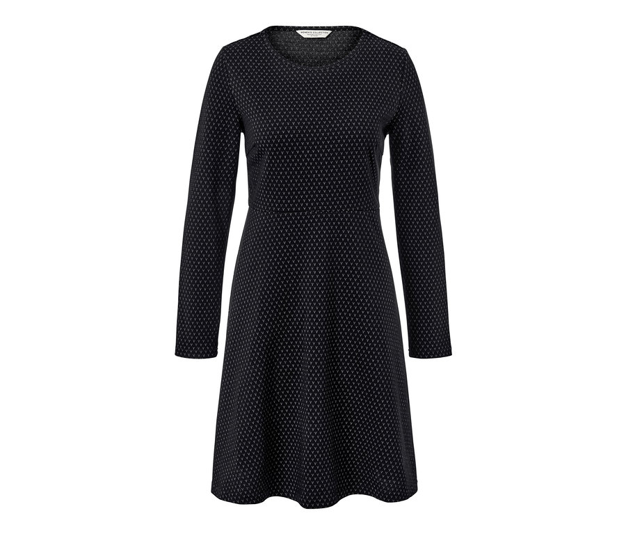 Ein glitzerndes Jacquard-Kleid in Schwarz wird gezeigt.