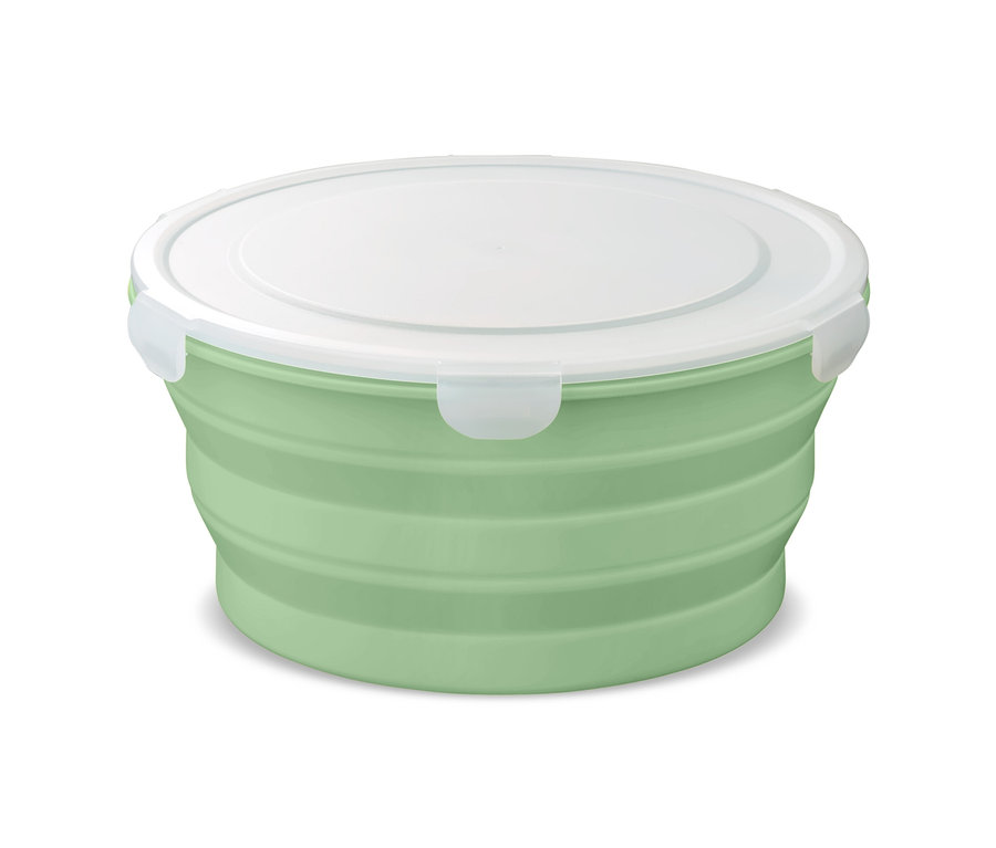Eine grüne faltbare Salatschüssel mit weißem Deckel.