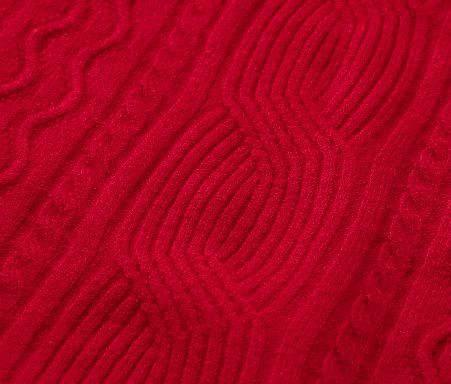 Detailaufnahme eines roten Strickmusters.