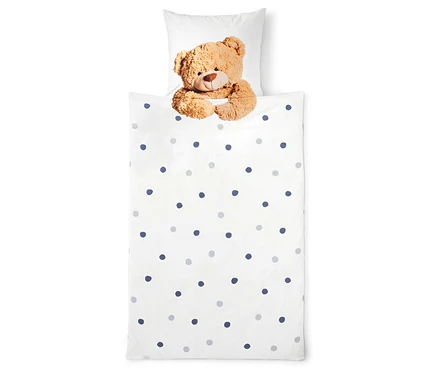 Bettwäsche mit Teddybär und Punkten.