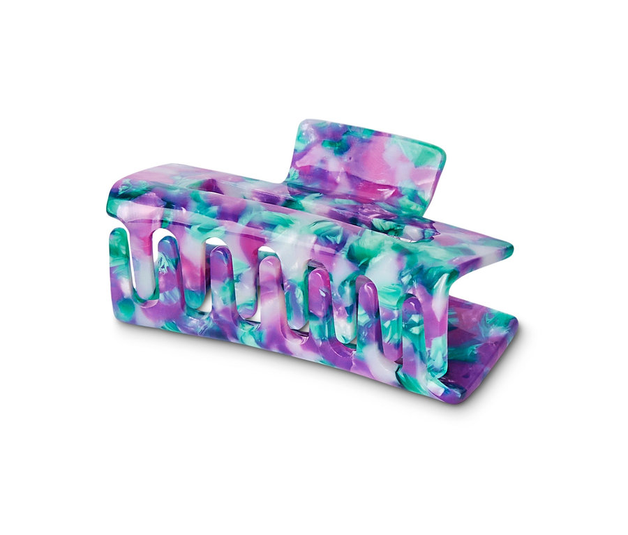 Detail einer bunten Haarklemme.