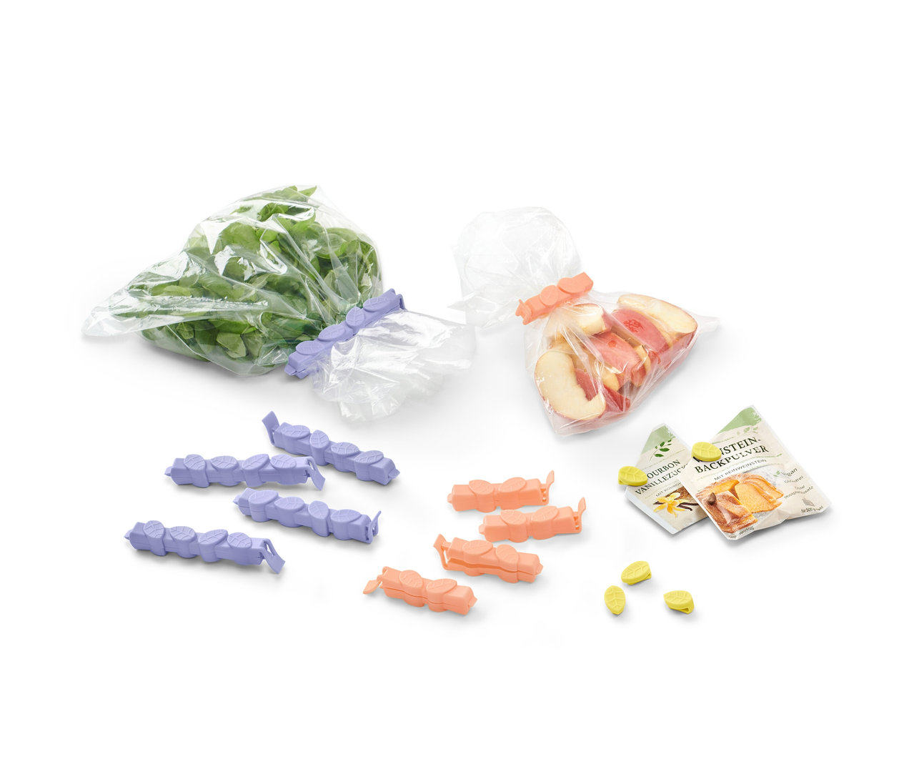 Gemüse und geschnittene Pfirsiche in Beuteln, die mit 15 Aromaclips verschlossen sind.