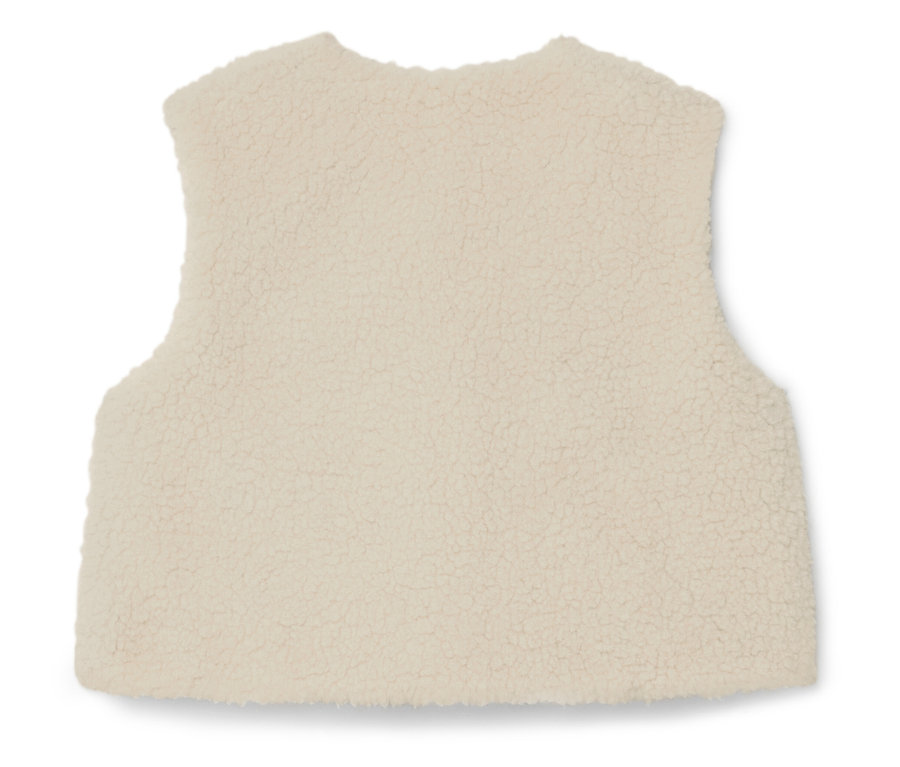 Nahaufnahme einer cremefarbenen, ärmellosen Fleeceweste.