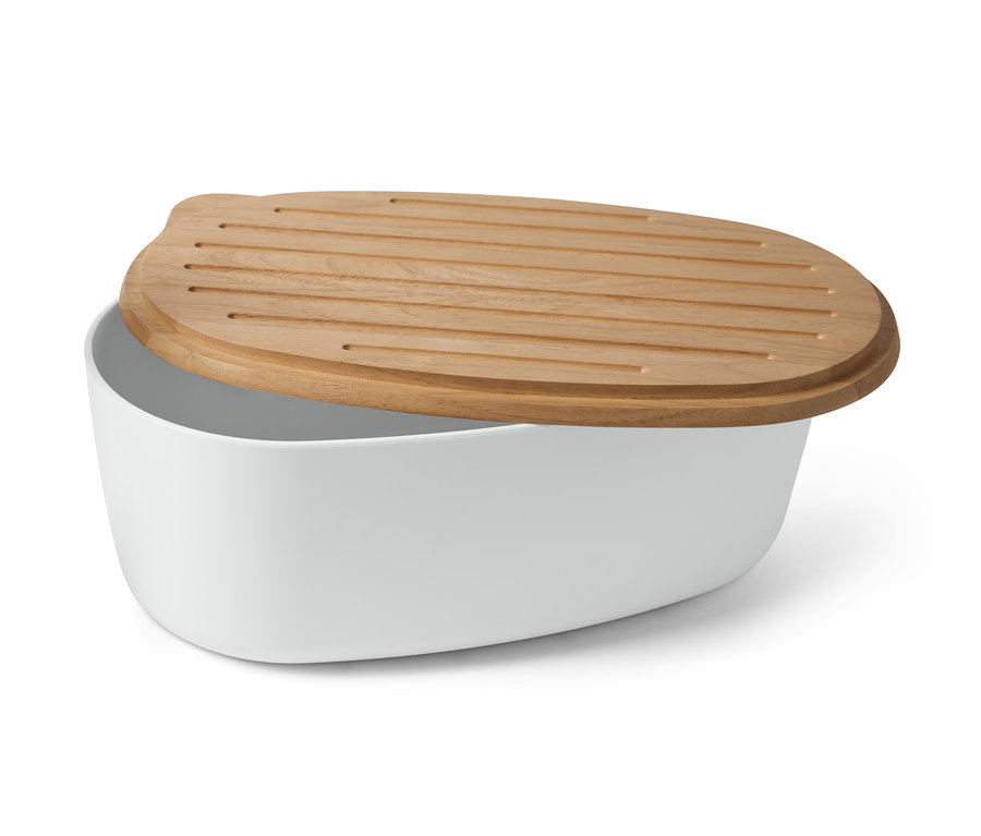 Weißer Brotkasten mit Schneidebrett.