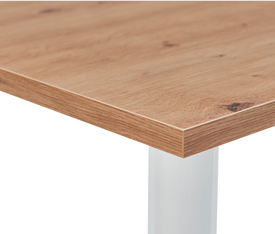 Detail einer Tischplatte des höhenverstellbaren Kindertisches mit weissem Bein.