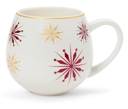 Weiße Tasse mit roten und goldenen Schneeflocken.