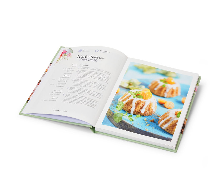 Offenes Buch "Kleines Kuchenglück" mit Abbildung von Mini-Gugelhupfen.