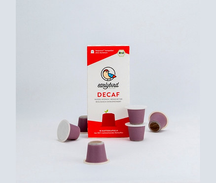 Eine Packung Earlybird Decaf Kaffeekapseln mit zehn violetten Kapseln auf einem weißen Hintergrund.