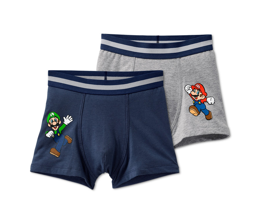 Zwei Slipboxer »Super Mario«: eine dunkelblaue mit Luigi-Motiv, die andere grau mit Mario-Motiv.